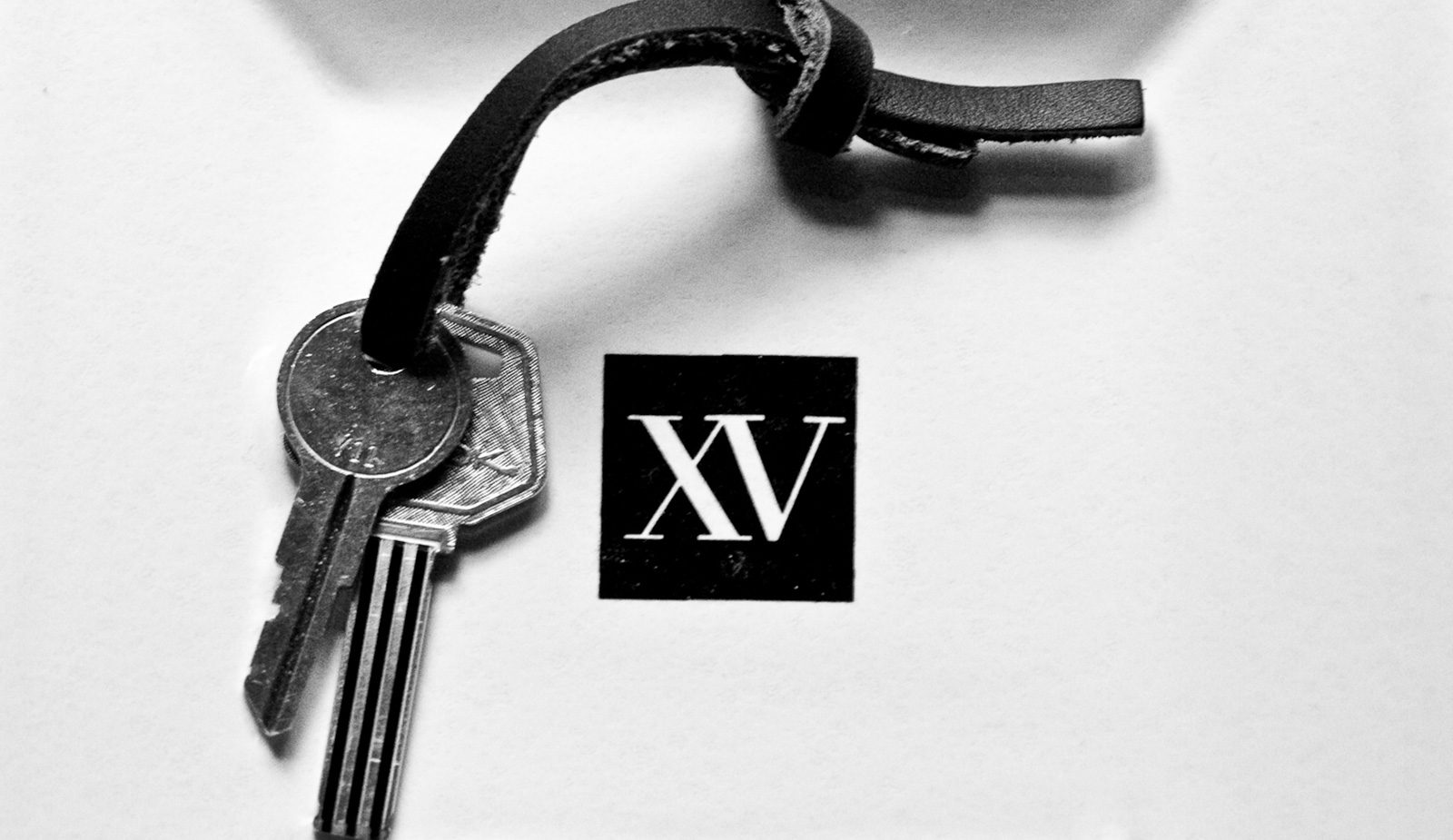 black and white photo of fifteen beacon's old room keys